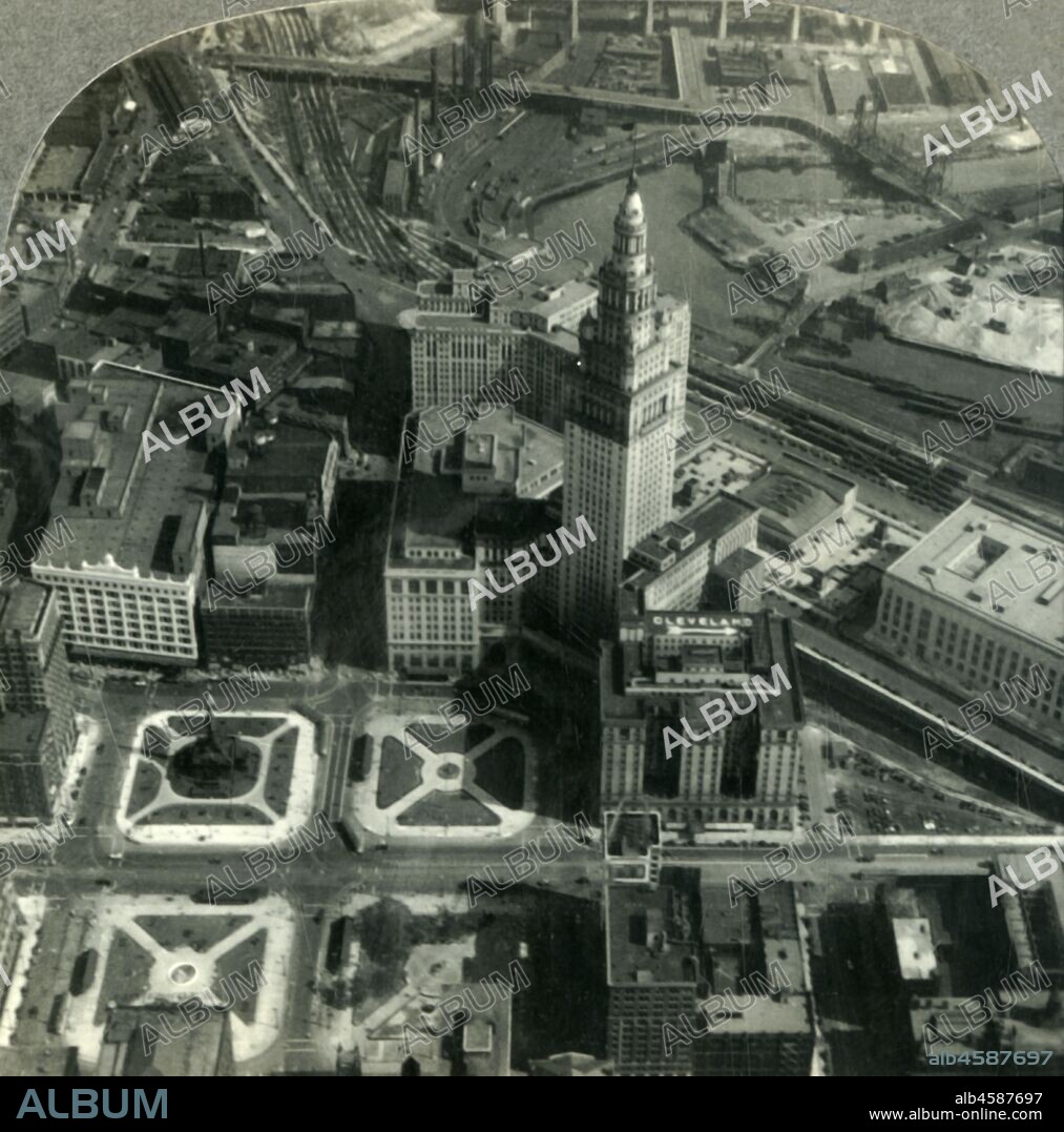 'An Air View of Downtown Cleveland - the Public Square, the Terminal Tower and the Winding Cuyahoga', c1930s. Terminal Tower built 1926-1930 on the Cuyahoga River was the tallest building in North America outside of New York City on it's completion. From "Tour of the World". [Keystone View Company, Meadville, Pa., New York, Chicago, London].