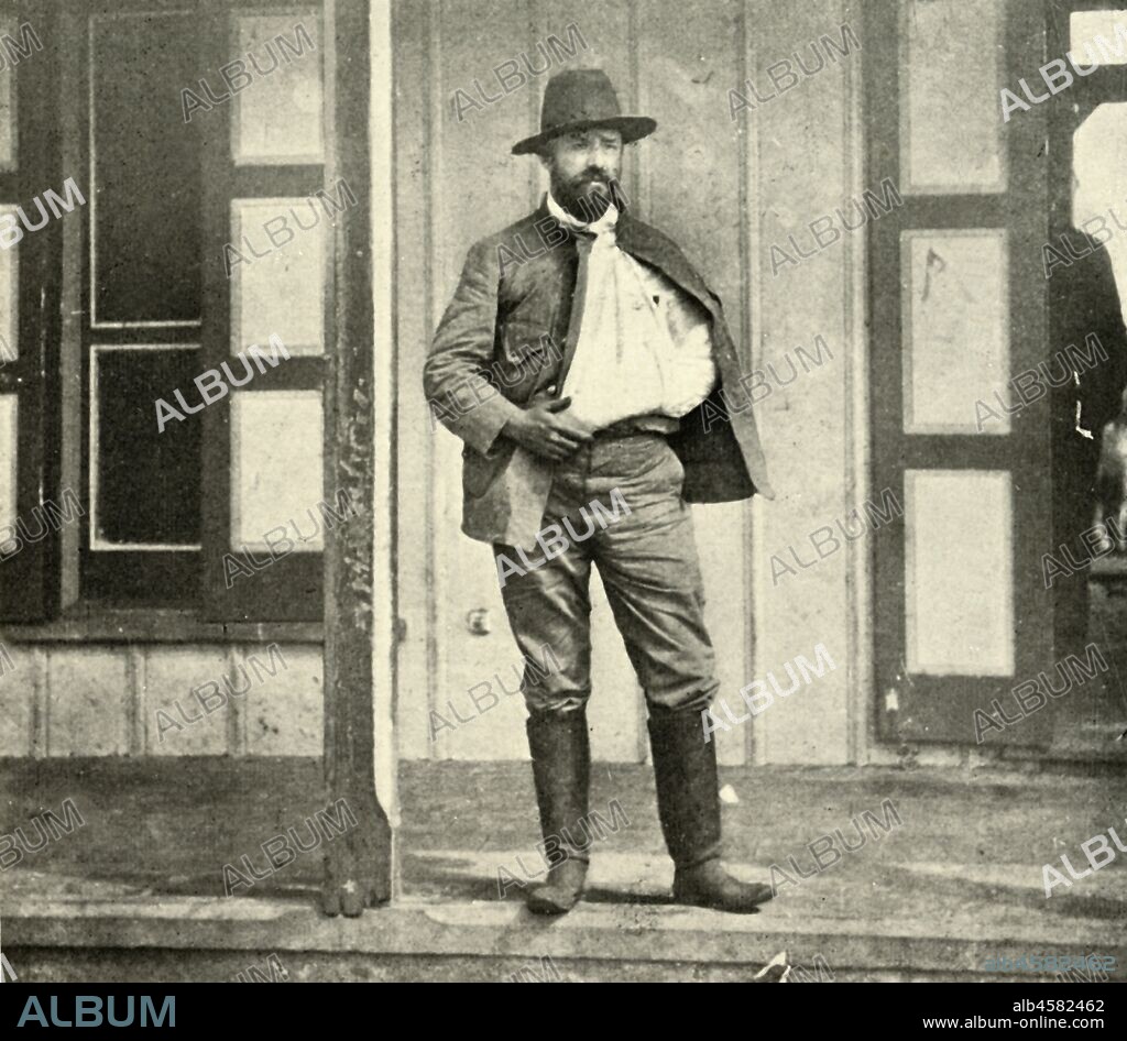 'Creelman, just after Dismounting from Horse...', Spanish-American War, 4 July 1898, (1899). 'Creelman, just after Dismounting from Horse which had Carried him from Hospital, Eleven Miles away, July 4th: Last Picture I Took in Cuba'. While a war correspondent for the "New York Journal", Canadian-American writer James Creelman (1859-1915) 'started off for El Caney, where he distinguished himself by very foolhardy work and reckless bravery; it was he who pulled down the Spanish flag from the block-house.' Creelman was permitted by the U.S. general in command to join the charge on a blockhouse occupied by Spanish troops. Advancing with US troops, and seeing the Spanish flag lying on the ground, Creelman seized it, feeling that the "Journal" should be the first to capture the enemy flag. He waved it in front of Spanish soldiers who responded with gunfire, wounding him in the arm and back. From "The Little I saw of Cuba" by Burr McIntosh, with photographs by the author. (In 1898, American actor and journalist William Burr McIntosh went to Cuba to cover the Spanish-American War for "Leslie's Weekly" as a reporter and photographer). [F. Tennyson Neely, London & New York, 1899].