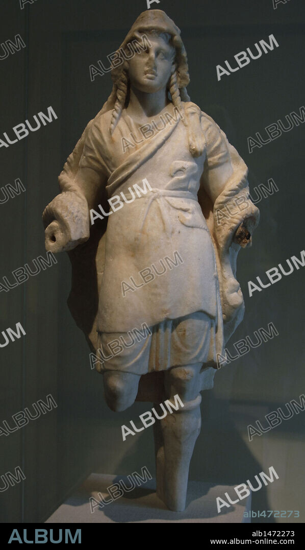 Greek Art. Early Hellenistic. Marble statuette of Dionysos. 3rd century BC. Dressed with chiton, leather belt panther, goat skin as a cape and Thracian boots. Comes from Koukouvaones (Attica). Metropolitan Museum of Art. New York. United States.