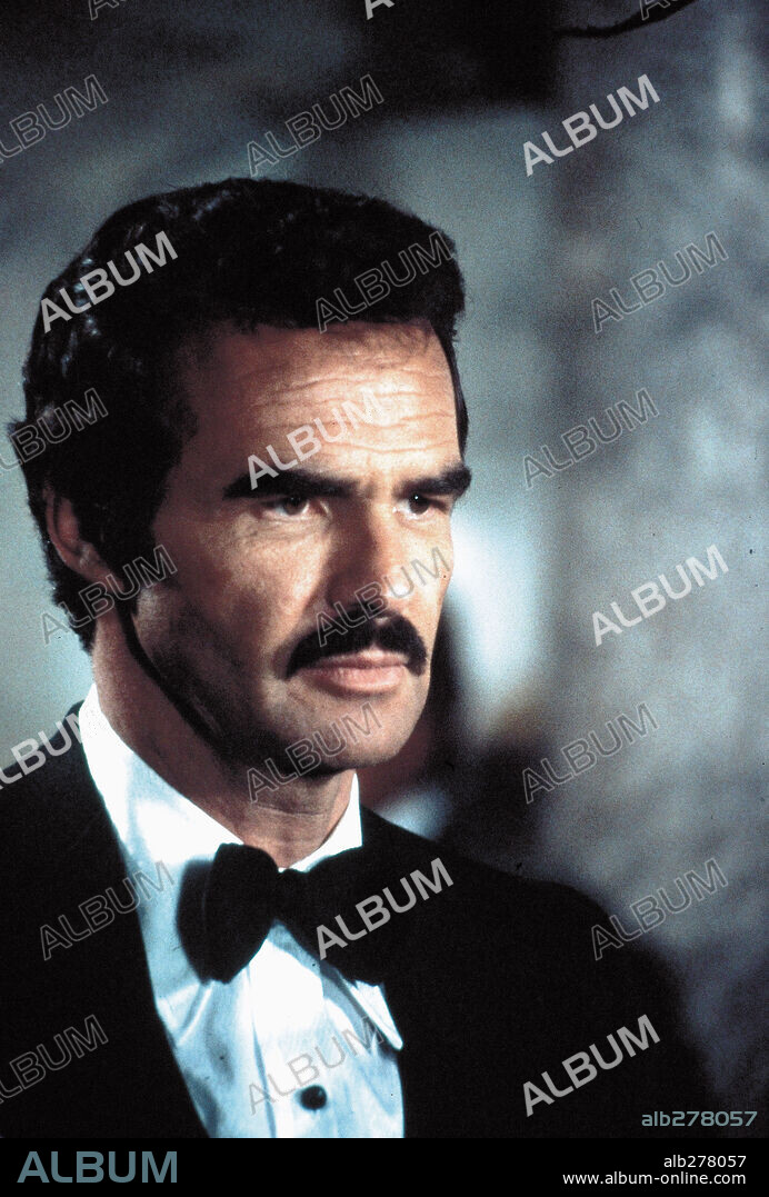 BURT REYNOLDS in ROUGH CUT, 1980, directed by DON SIEGEL. Copyright PARAMOUNT PICTURES.