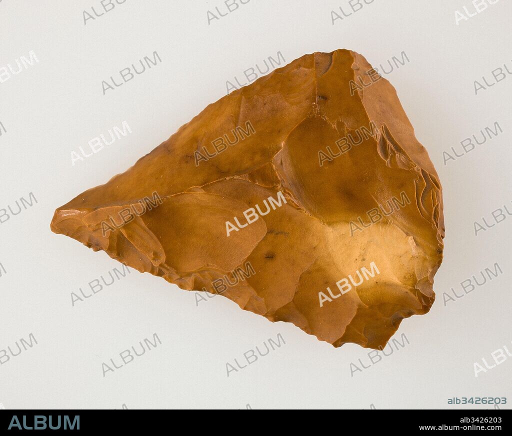 Flake Tool, Middle Paleolithic, ca. 90,000–35,000 B.C., From Egypt, Western Desert; Kharga Oasis, Beledeh District, W and NW of Christian necropolis, surface find, 1908–10, Flint, H. 7 x W. 5.4 x Th. 1.7 cm (2 3/4 x 2 1/8 x 11/16 in.), This tool was created from a flake knocked off from a larger core. There are no obvious signs of working, but one side (lower edge in photograph) appears to have been used, perhaps as a scraper. Flake tools, especially those showing the Levallois technique, and not core tools, characterize the Middle Paleolithic Period (90,000-35,000 B.