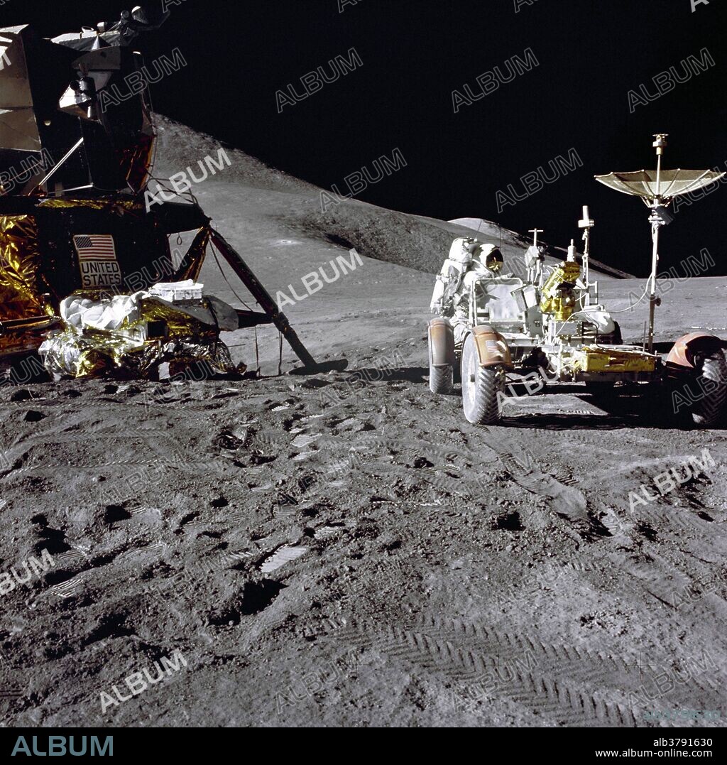 Apollo 15 lunar module pilot Jim Irwin loads the lunar rover with tools and equipment in preparation for the first lunar spacewalk at the Hadley-Apennine landing site. The Lunar Module 'Falcon' appears on the left in this image. The undeployed Laser Ranging Retro-Reflector lies atop Falcon's Modular Equipment Stowage Assembly. Apollo 15 launched on July 26, 1971.