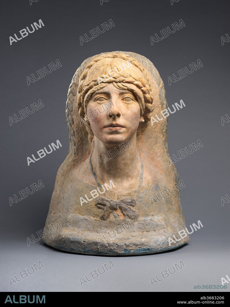 Irene Millet. Artist: Antoine-Émile Bourdelle (French, Montauban 1861-1929 Vésinet). Culture: French, Paris. Dimensions: 20 1/2 × 15 3/4 × 10 3/4 in. (52.1 × 40 × 27.3 cm). Date: 1917.
Greco-Egyptian funerary portraiture provided the stylistic inspiration for this bust.  The subdued polychromy indicates that it was intended for execution in pâte de verre; an example of the head alone in that medium is in the Musée Bourdelle, Paris. Mrs. Millet and her husband were the donors of the Museum's monumental bronze Herakles the Archer by Bourdelle (24.232).