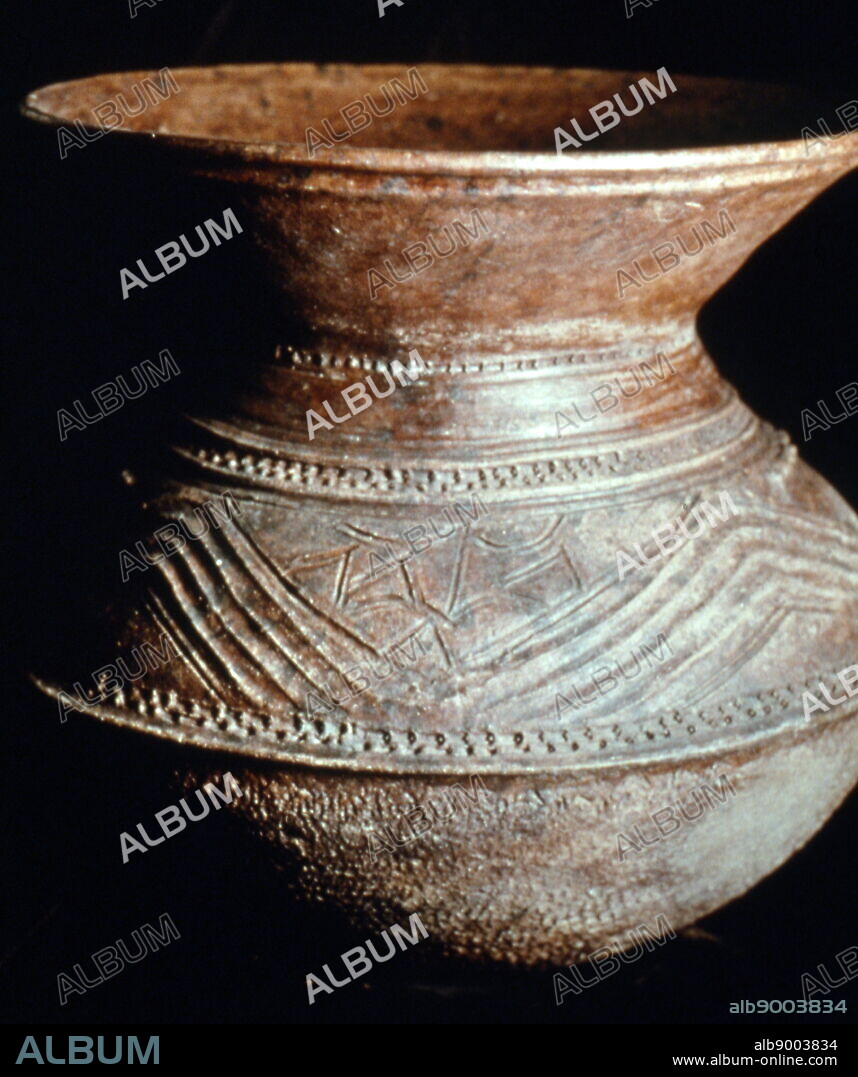 Yoruba incised ceramic ritual pot for the goddess Oshun. Nigeria, 1970. Oshun (known as Ochun or Oxum in Latin America) also spelled Osun, is an orisha, a spirit or deity that reflects one of the manifestations of God in the Ifa and Yoruba religions. She is one of the most popular and venerated orishas. Oshun is the deity of the river and fresh water, luxury and pleasure, sexuality and fertility, and beauty and love.