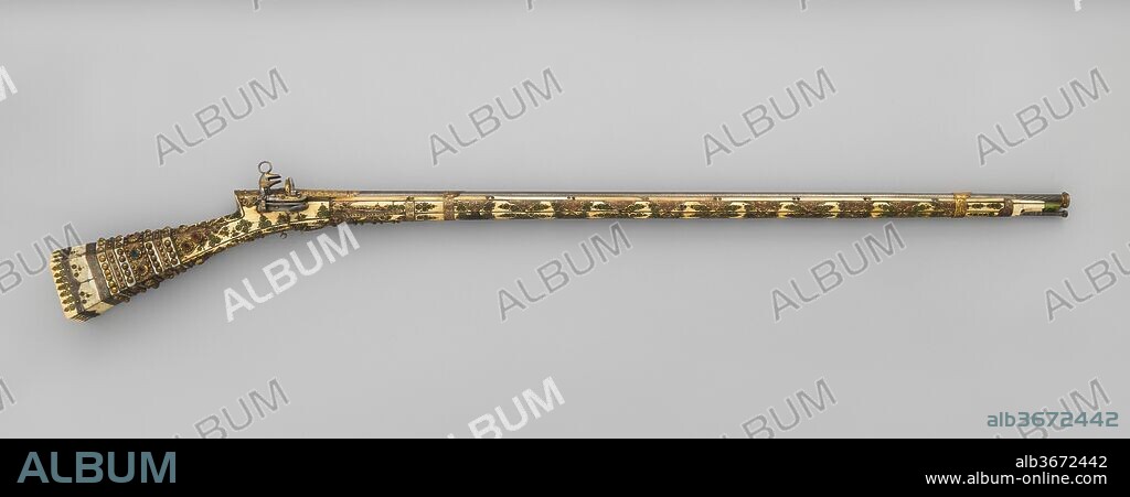 Miquelet Rifle. Culture: Turkish. Dimensions: L. 60 3/4 in. (154.31 cm); L. barrel 47 in. (119.4 cm); Cal. .48 in. (12.0 mm); Wt. 10 lb. 12 oz. (4862 g). Date: late 18th century.
The miquelet is an early and sturdy form of flintlock popular throughout the Ottoman Empire from the seventeenth into the early twentieth century. Several elaborately decorated guns very similar to this example are still preserved in Istanbul, possibly made for the Ottoman Imperial guard.