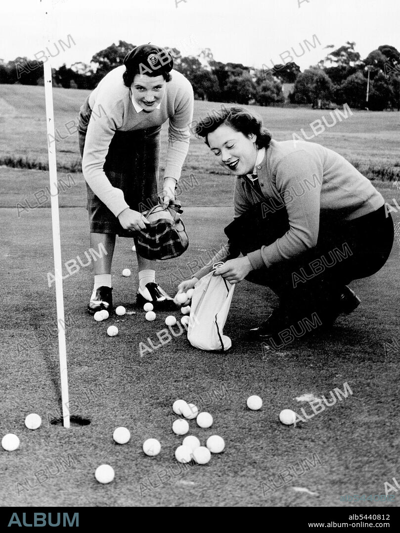 Janette Robertson Veronica Anstey Magarey Medallists -- Golf Balls ***** at Kooyonga yesterday ... out of ***** and on to the greens...while the visiting British ***** golfers practised. And the girls took plenty of golf balls ***** here Janette Robertson, left, and Veronica Anstey sort them out after a trial round. the team played in an invitation tournament today at Kooyonga. July 19, 1955. (Photo by "The News" and "The Mall").