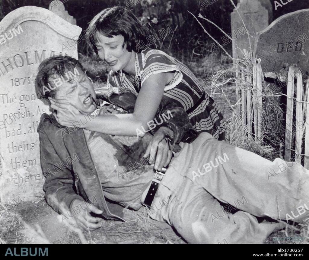 CAROLYN JONES and MICKEY ROONEY in BABY FACE NELSON, 1957, directed by DON SIEGEL. Copyright UNITED ARTISTS.
