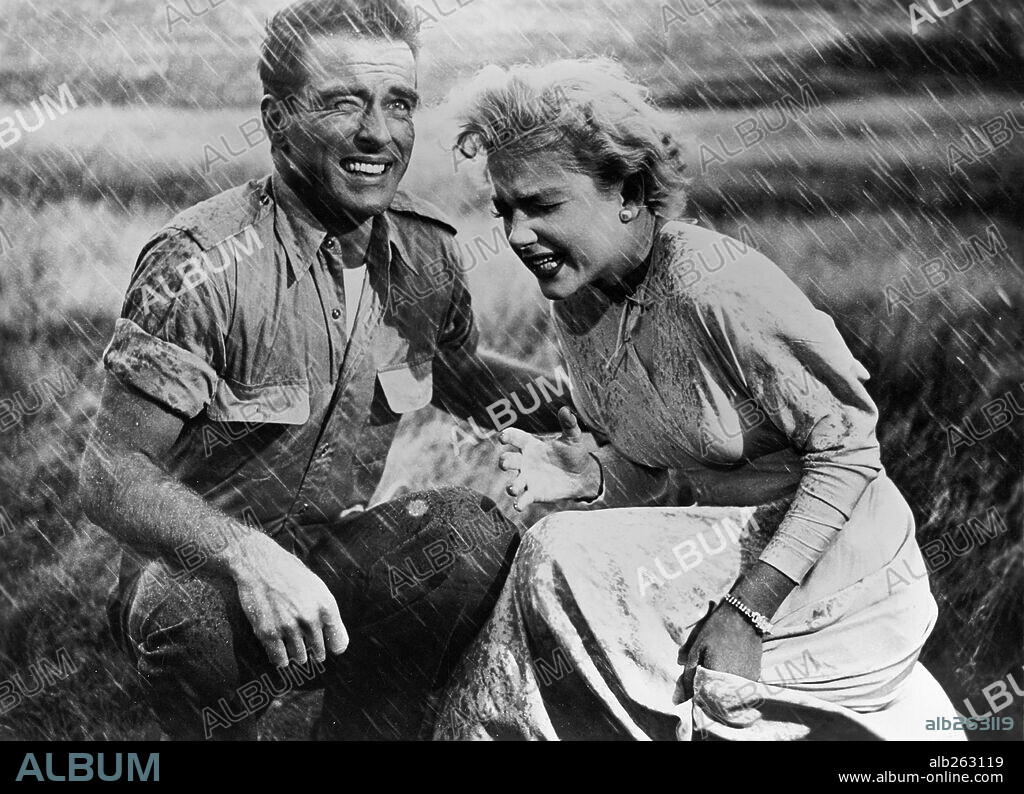 ANNE BAXTER and MONTGOMERY CLIFT in I CONFESS, 1953, directed by ALFRED HITCHCOCK. Copyright WARNER BROTHERS.