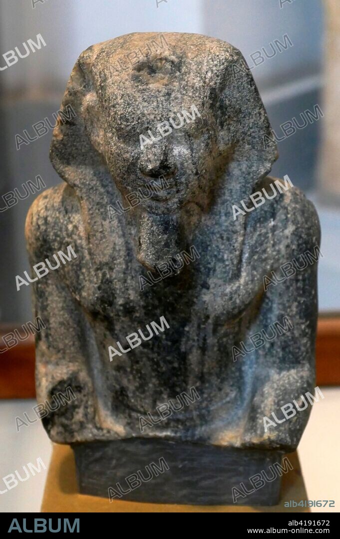 Diorite statuette of King Menkaure. an ancient Egyptian king (pharaoh) of the 4th dynasty during the Old Kingdom. who is well known under his Hellenized names Mykerinos. Menkaure became famous for his tomb. the Pyramid of Menkaure. at Giza.