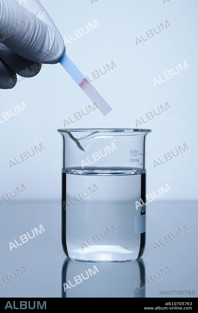 Cobalt chloride test paper. When dipped into water, cobalt (II) chloride (CoCl2) test paper changes its colour from blue (anhydrous CoCl2) to purple (dihydrate CoCl2 2H2O) to pink (hexahydrate CoCl2 6H2O). Therefore it is often used as a water (humidity) detector.