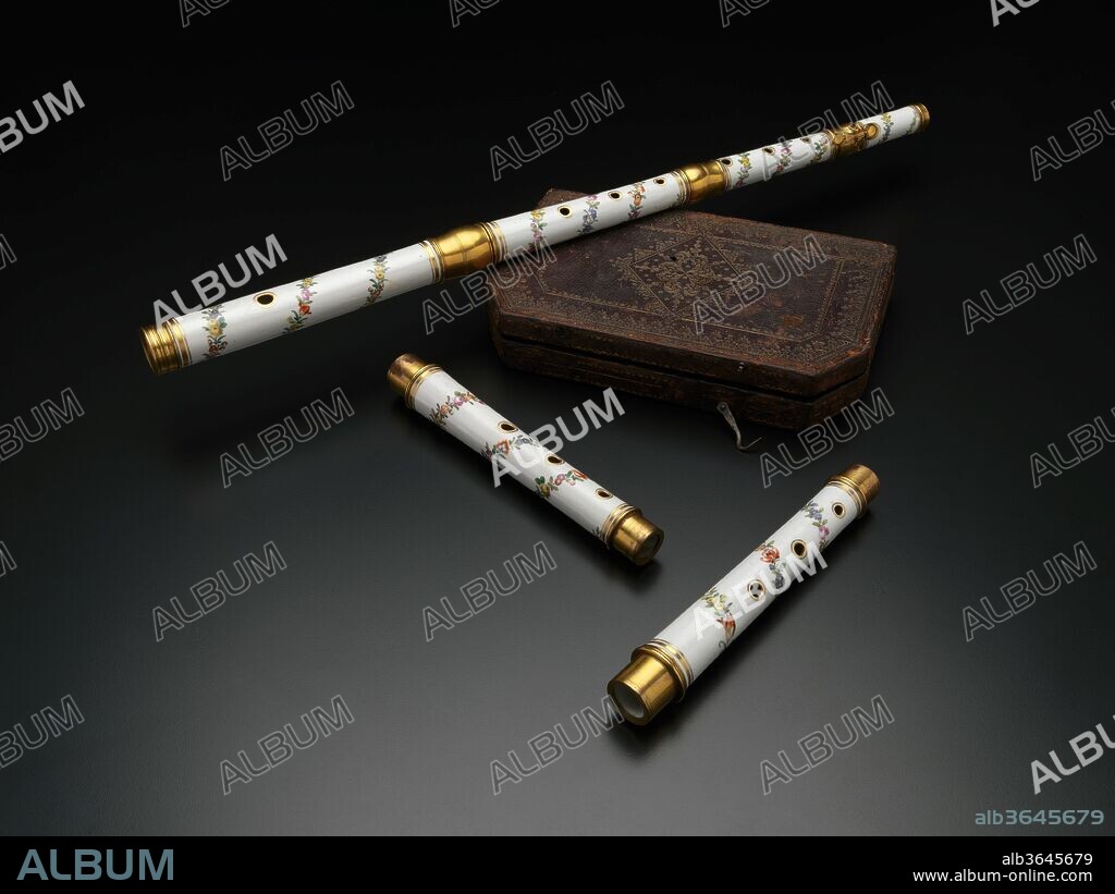 Transverse Flute in D-flat. Culture: German. Dimensions: Height: 24 5/16 in. (61.7 cm). Date: 1760-90.
Johan Friedrich Böttger's rediscovery of hard-paste porcelain in 1708 was the basis of a new luxury industry. Makers explored all kinds of applications in the new medium. Porcelain musical instruments posed enormous problems since during drying and firing there occurred substantial shrinkage. In the kiln, wet porcelain matter shrinks by a third of its volume so large molds had to be made to guarantee the precise final dimensions of bore, finger- and embouchure hole. Wooden flutes are easily fine-tuned and voiced by drilling; porcelain, however, makes later manipulations problematic. Porcelain flutes and carillons were rare, but ocarinas like one from Dresden in the Museum's collection were more common. After the porcelain sections of this flute, including its decoration, had been fired, a goldsmith completed the metal work, making joints, sockets, cap and key. Porcelain flutes were known only in the circles of high nobility.  Another example of a porcelain flute is found in the British Royal Collection.