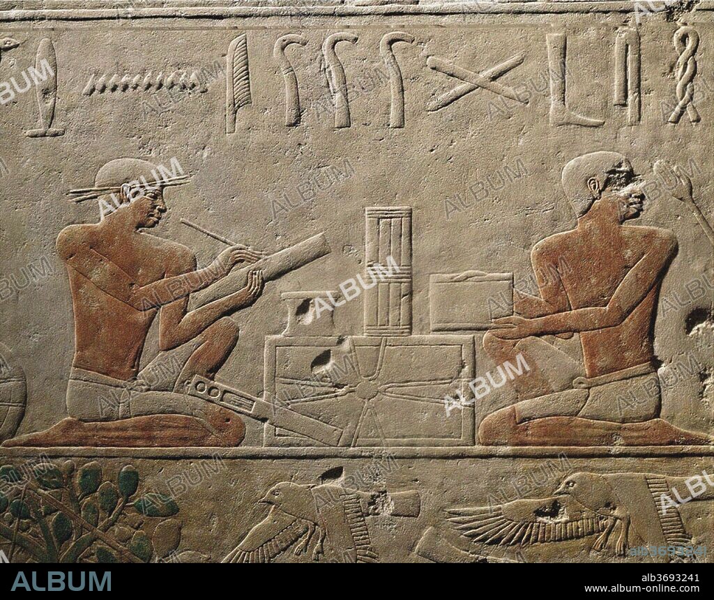 ANCIENT EGYPT. Two Scribes. Relief from Mastaba of Akhethotep at Saqqara, Old Kingdom, 5th Dynasty.