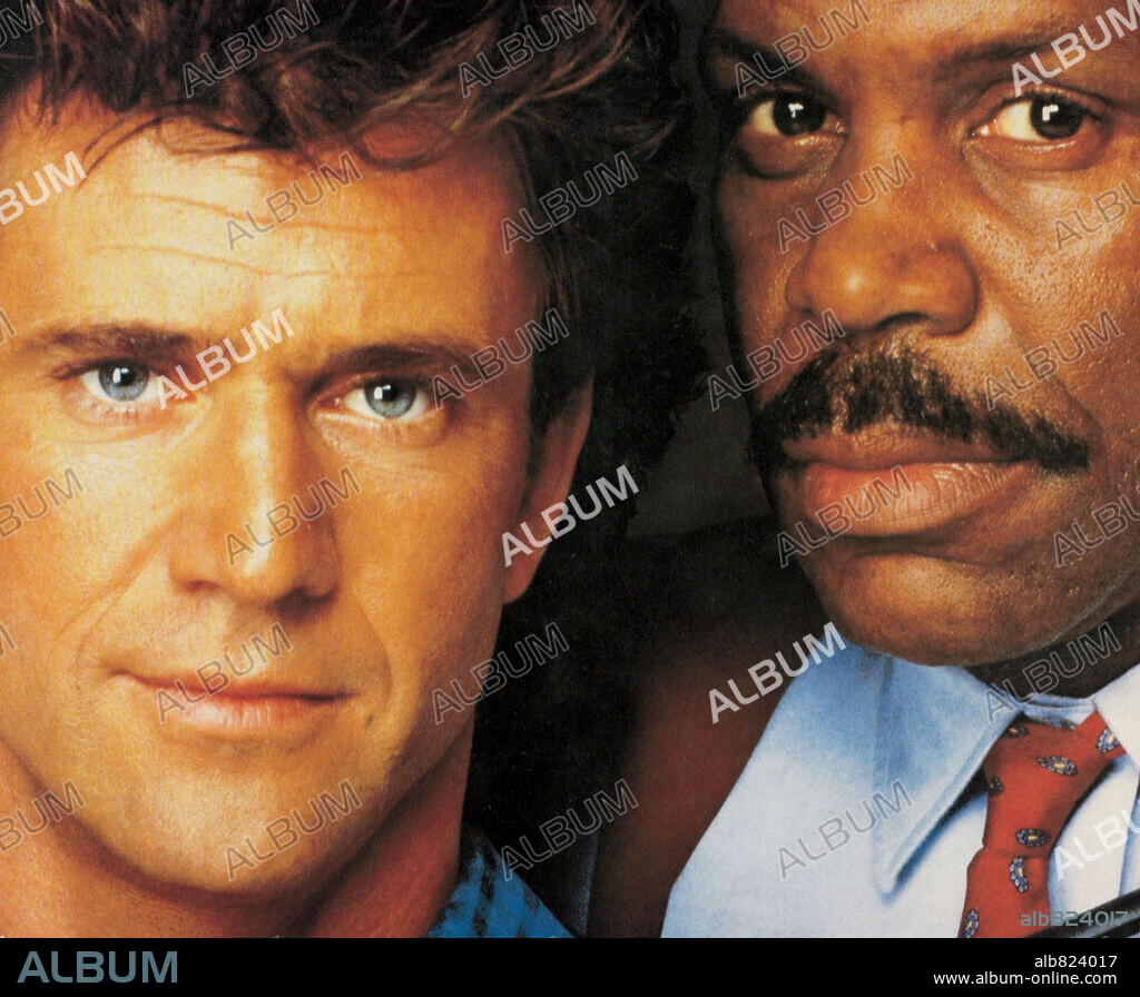 DANNY GLOVER y MEL GIBSON en ARMA LETAL II, 1989 (LETHAL WEAPON 2), dirigida por RICHARD DONNER. Copyright WARNER BROTHERS.
