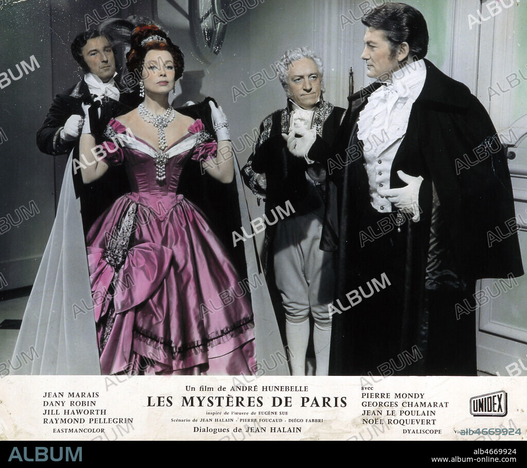 'Les Mysteres de Paris, un film de Andre Hunebelle'. Photo colorisee datee de 1962 montrant Jean MARAIS accompagne d'une femme en tenue de soiree pour la presentation de l'adaptation cinematographique de l'ouvrage d'Eugene SUE (1804-1857) publie en 1843. Credit : Collection KHARBINE-TAPABOR.