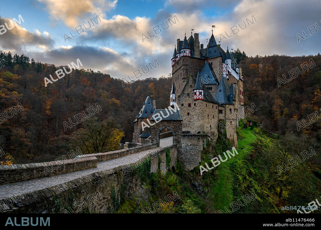 Eltz medieval historic castle in an autumn landscape with trees at sunrise, Wierschem, Rhineland-Palatinate, Germany, Europe.