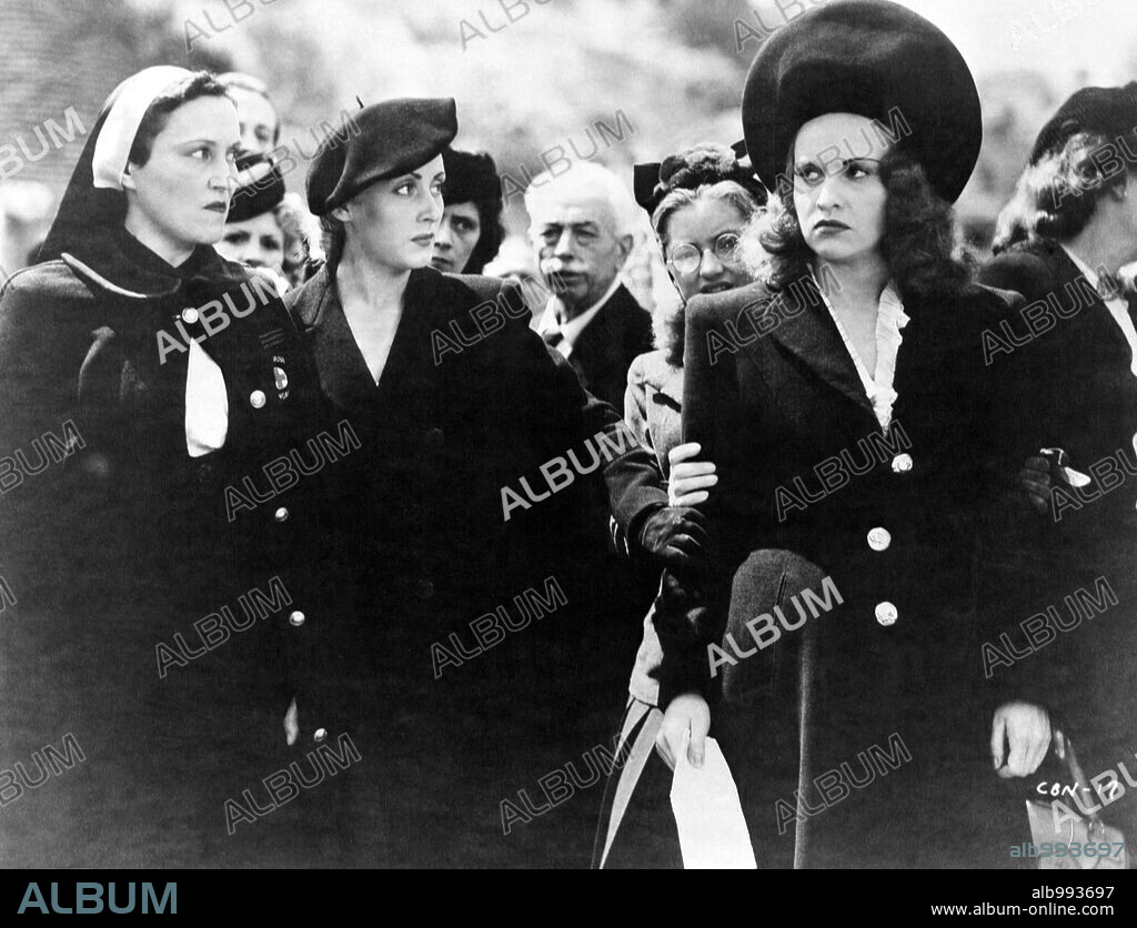 GINETTE LECLERC, HELENA MANSON, LILIANE MAIGNE and MICHELINE FRANCEY in THE RAVEN, 1943 (LE CORBEAU), directed by HENRI-GEORGES CLOUZOT. Copyright CONTINENTAL.