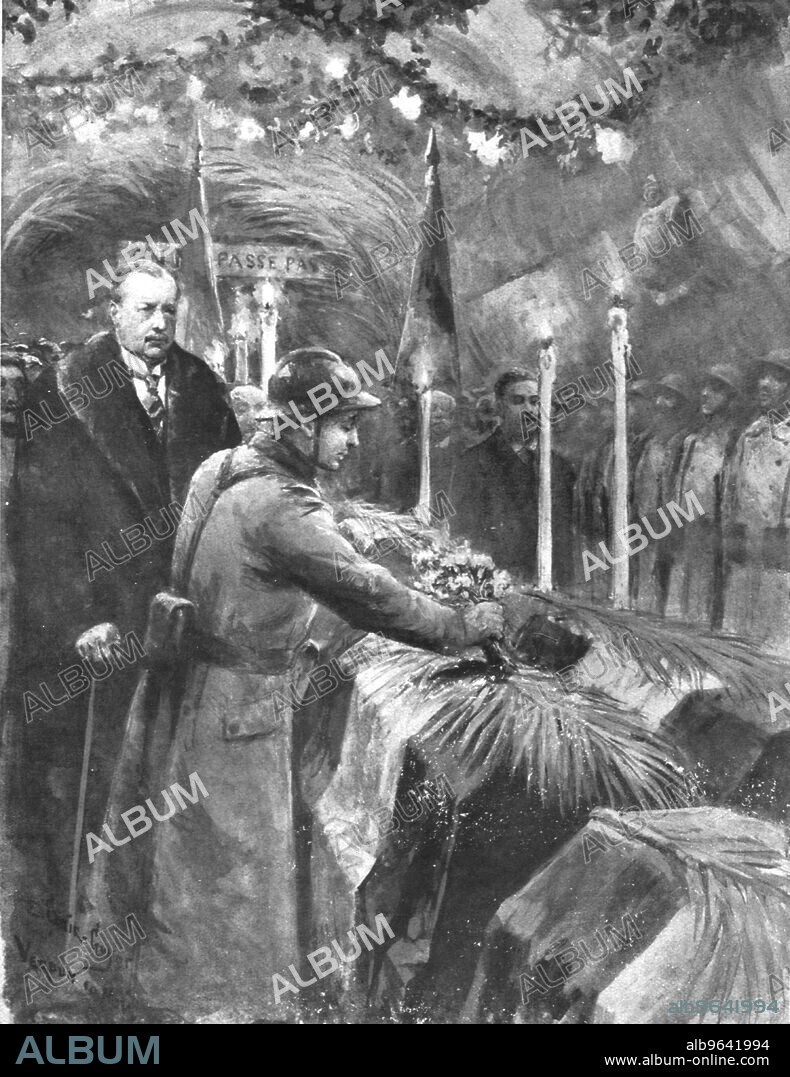 E CLAIR-GUYOT. 'le Soldat inconnu; le choix Soldat inconnu, le 10 novembre 1920, a 3 heurs de l'apres-midi, a la citadelle de Verdun: le soldat Auguste Thin, du 132e, designe le corps en deposant quelques fleurs sur la biere; derriere lui, le delegue du gouvernement, M Maginot, ministre des Pensions, mutile de guerre', 1920. From "L'Album de la Guerre 1914-1919, Volume 2" [L'Illustration, Paris, 1924].