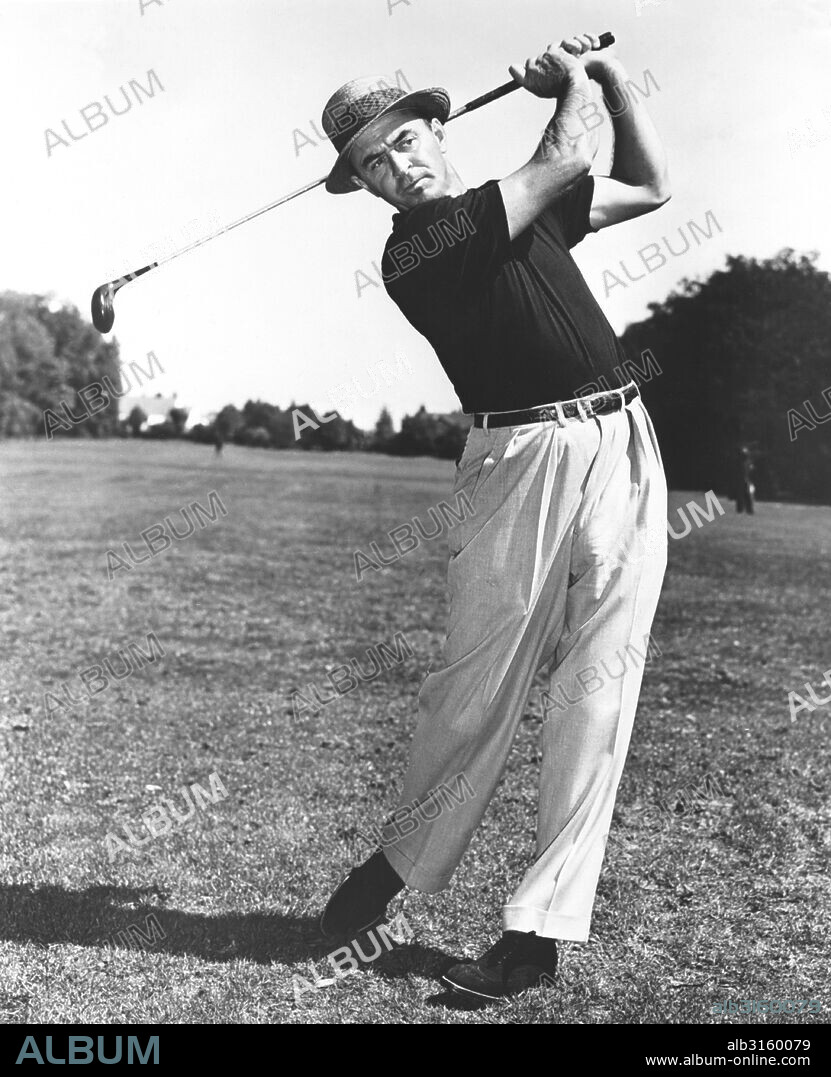 United States: c. 1950 Sam Snead at the end of a golf swing.