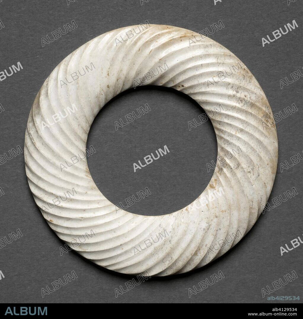 Ring. China. Date: 400 BC-200 BC. Dimensions: Diam. 5.2 cm (2 1/16 in.); Thickness: 0.3 cm (1/8 in.). Jade. Origin: China.