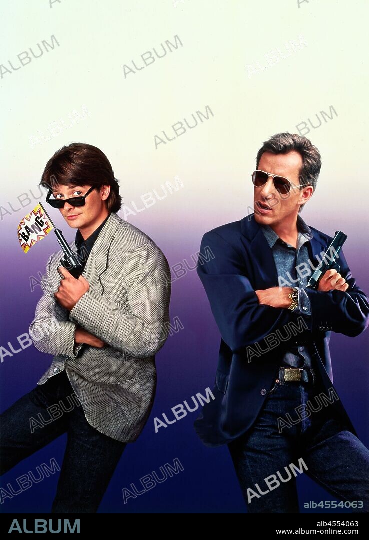 MICHAEL J FOX y JAMES WOODS. JAMES WOODS y MICHAEL J. FOX en COLEGAS A LA FUERZA, 1991 (THE HARD WAY), dirigida por JOHN BADHAM. Copyright UNIVERSAL PICTURES.