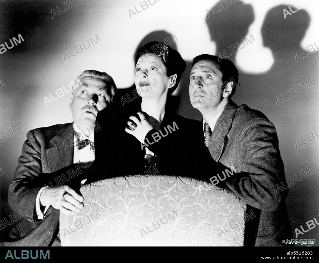 BASIL RATHBONE, GALE SONDERGAARD and NIGEL BRUCE in THE SPIDER WOMAN, 1943, directed by ROY WILLIAM NEILL. Copyright UNIVERSAL PICTURES.
