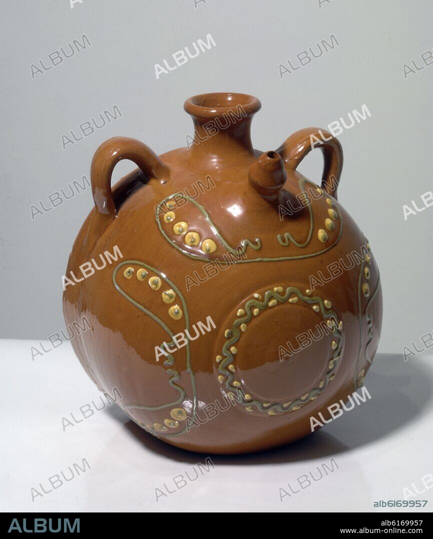 BOTIJO VIDRIADO Y DECORADO EN AMARILLO Y VERDE-CERAMICA POPULAR S XX.