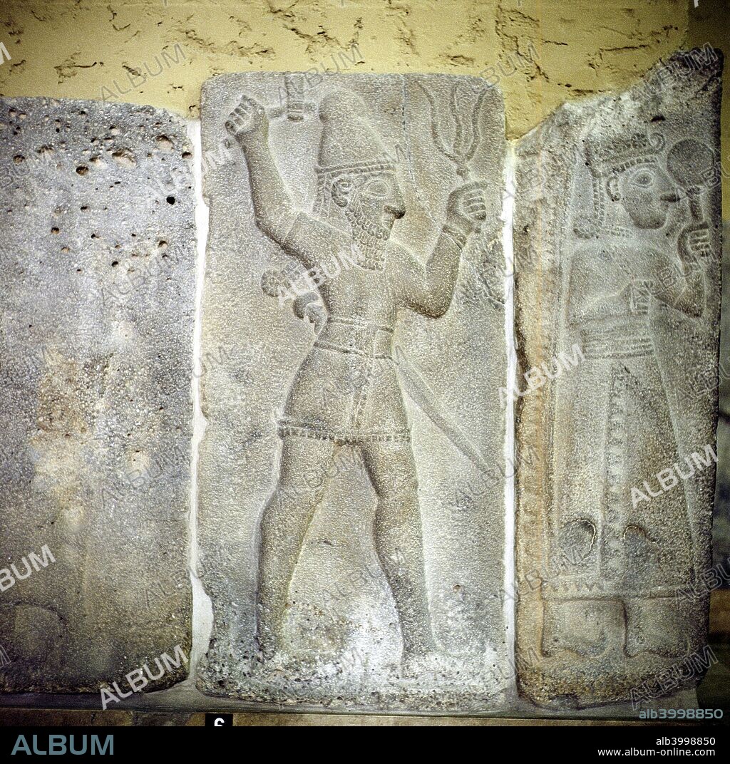 Hittite relief of the weather-god Teshub with lightning. In the collection at the Pergamon Museum in Berlin.