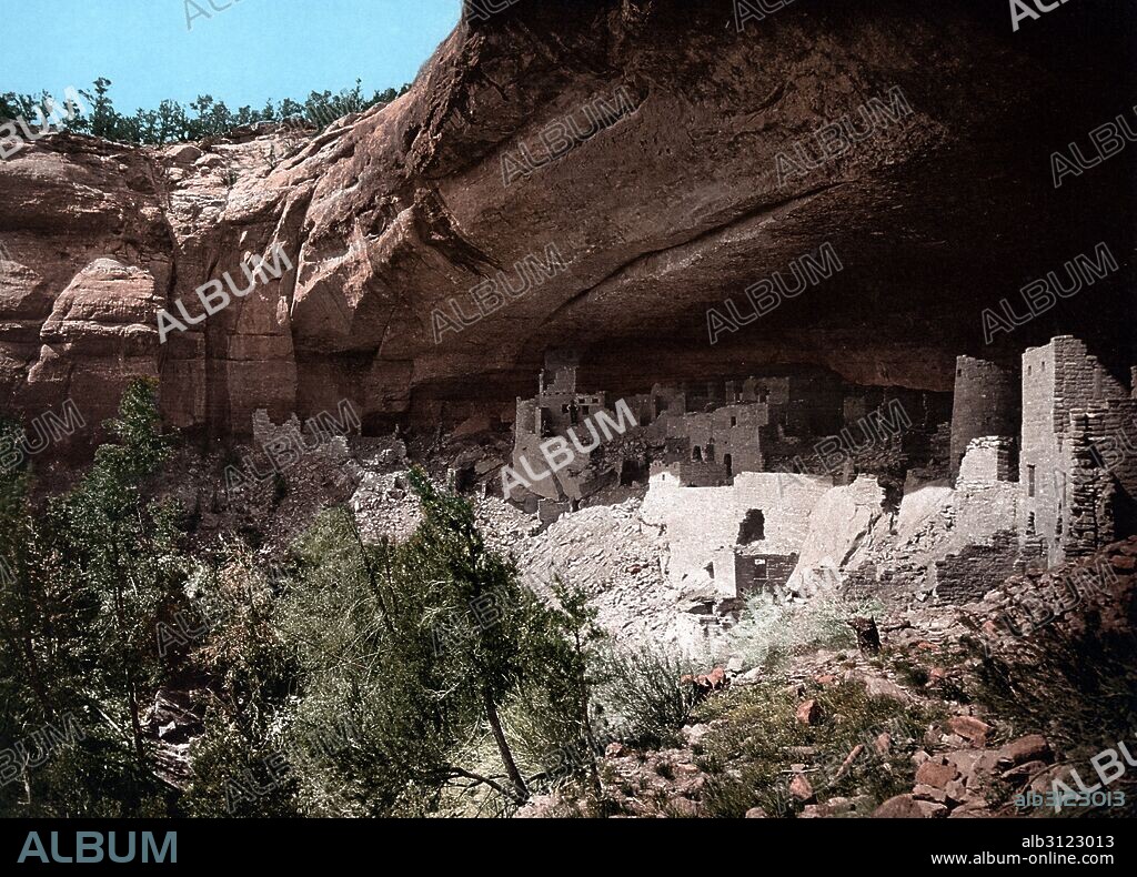 Colour photograph of Cliff Palace. The largest cliff dwelling in North America. The structure built by the Ancestral Puebloans is located in Mesa Verde National Park in their former homeland region, Mesa Verde. Dated 1906.
