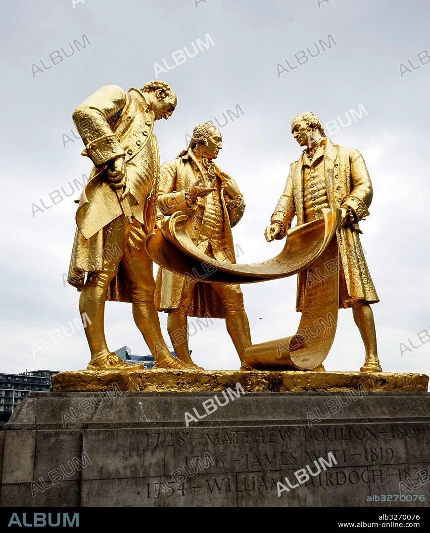 Gold statue titled 'Boulton, Murdoch and Watt' by William Bloye (1890-1975) an English sculptor. The statue is of three of Birmingham's most famous figures; Matthew Boulton (1728-1809), William Murdoch (1754-1839), and James Watt (1736-1819). Dated 20th Century.