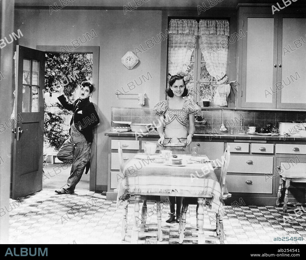 CHARLIE CHAPLIN und PAULETTE GODDARD in MODERN TIMES, 1936, unter der Regie von CHARLES CHAPLIN. Copyright CHAPLIN/UNITED ARTISTS.