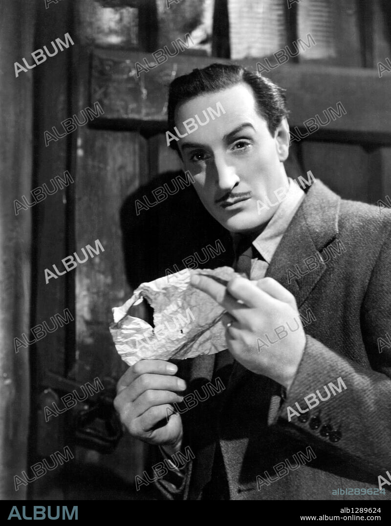 BASIL RATHBONE in A NIGHT OF TERROR, 1937 (LOVE FROM A STRANGER), directed by ROWLAND V. LEE. Copyright UNITED ARTISTS.