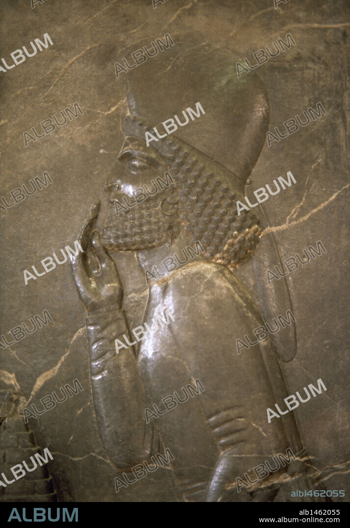 Achaemenid Empire. Relief of a Mede senior official (round cap) during a reception with Darius the Great (521-485 BC), 5th century BC. From Persepolis. Archaeological Museum of Tehran, Islamic Republic of Iran.