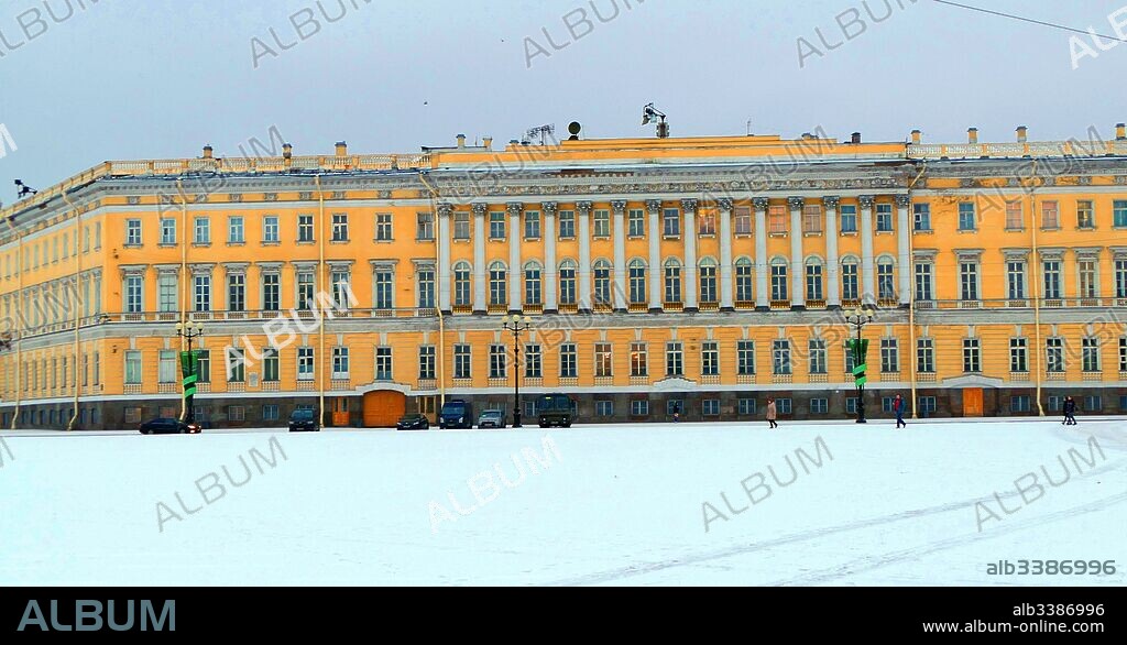 The General Staff Building on Palace Square in Saint Petersburg, Russia, in front of the Winter Palace. The Neoclassical building was designed by Carlo Rossi in the Empire style and built in 1819-1829. It consists of two wings, which are separated by a tripartite triumphal arch adorned by sculptors Stepan Pimenov and Vasily Demuth-Malinovsky, commemorating the Russian victory over Napoleonic France in the Patriotic War of 1812.