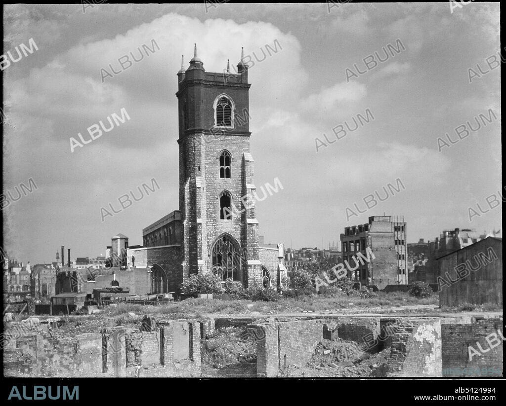 CHARLES WILLIAM PRICKETT. St Giles' Cripplegate, Fore Street, City and County of the City of London, Greater London Authority, 1941-1945. A view looking south-east across a bomb damaged landscape towards St Giles' Cripplegate Church. St Giles' Church was badly damaged during the Blitz in 1941 and the immediate area around it was almost completely destroyed by bombing. The church was rebuilt in the 1950s and now stands at the centre of the Barbican Estate.