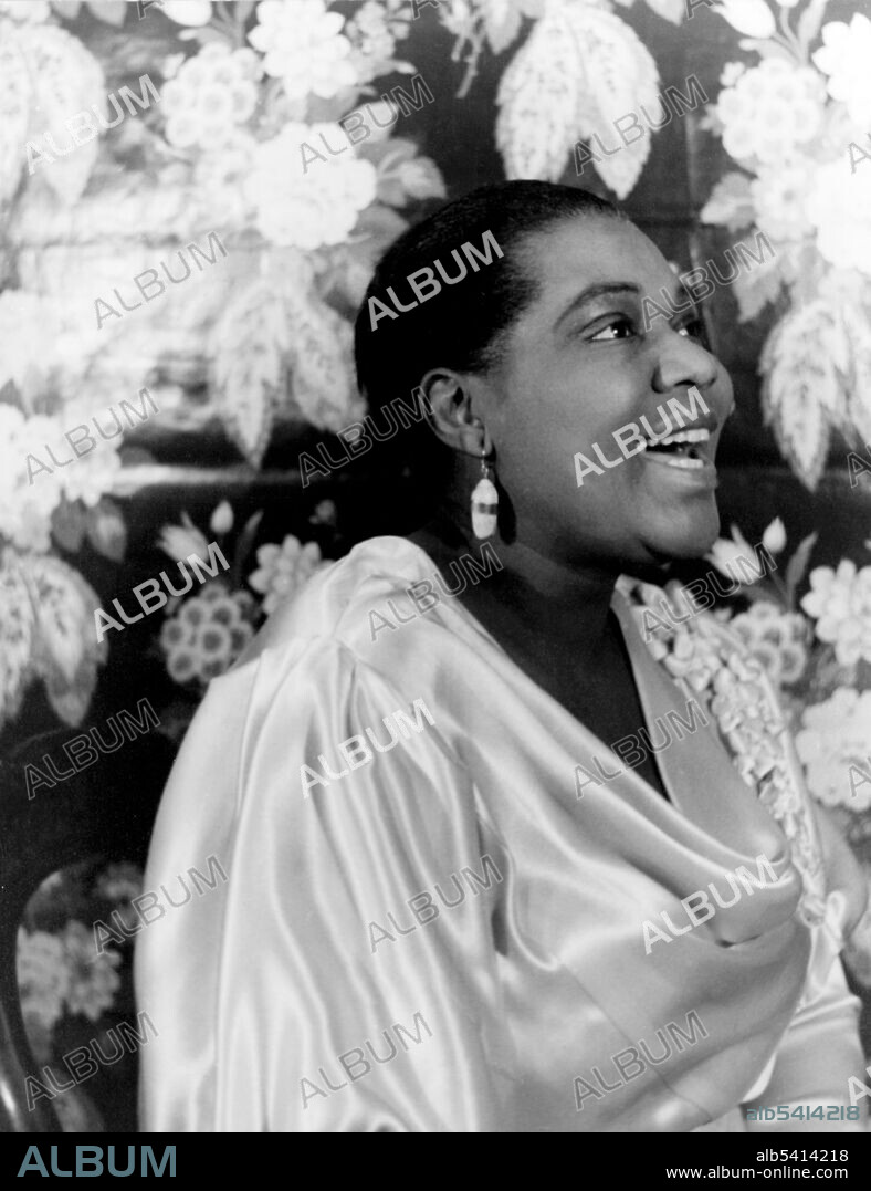 Bessie Smith (April 15, 1894 - September 26, 1937) was the most popular American blues singer of the 1920s-30s, often regarded as one of the greatest singers of her era and a major influence on subsequent jazz vocalists. In the 1920's Smith became the highest paid black entertainer of the day, heading her own shows, and touring in her own railroad car. Her career was cut short by the Great Depression and the advent of Hollywood talkies which spelled the end for vaudeville. Smith was critically injured in a car accident. At her funeral an estimated 10,000 mourners filed past her coffin. Carl Van Vechten, 1936 (cropped and cleaned).
