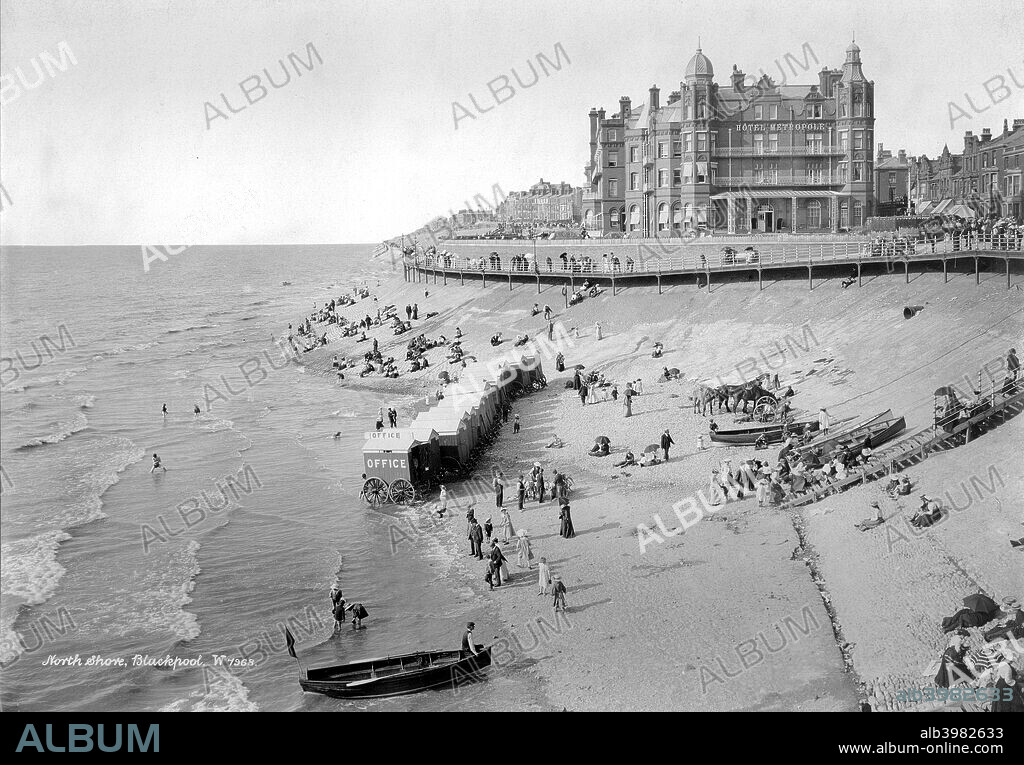 Hotel Metropole, Blackpool, Lancashire, 1890-1910. The Hotel Metropole as viewed from the north shore with holidaymakers on the beach in the foreground. It was built during or just after the 1860s. A number of bathing machines are lined up on the beach for potential swimmers.