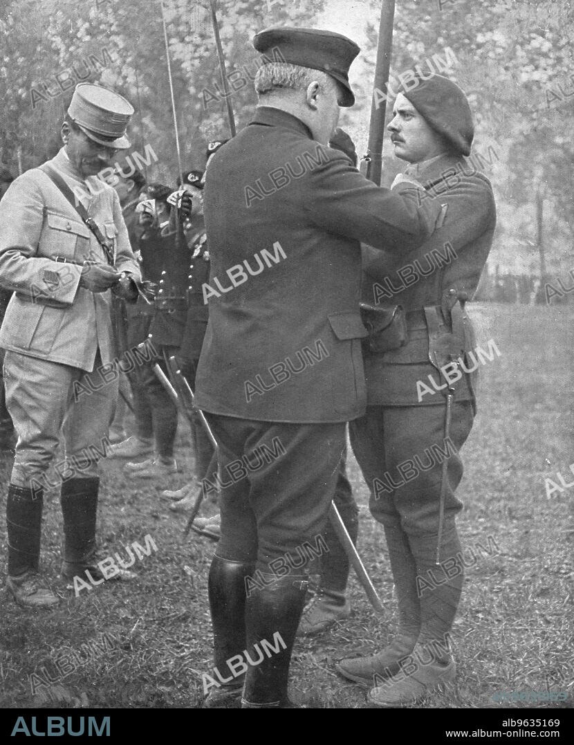 ''Autour de la Bataille; Le Caporal Goutaudier, decore par M Poincare de la Croix de la Legion D'Honneur', 1016. From "L'Album de la Guerre 1914-1919, Volume I" [L'Illustration, Paris, 1924].