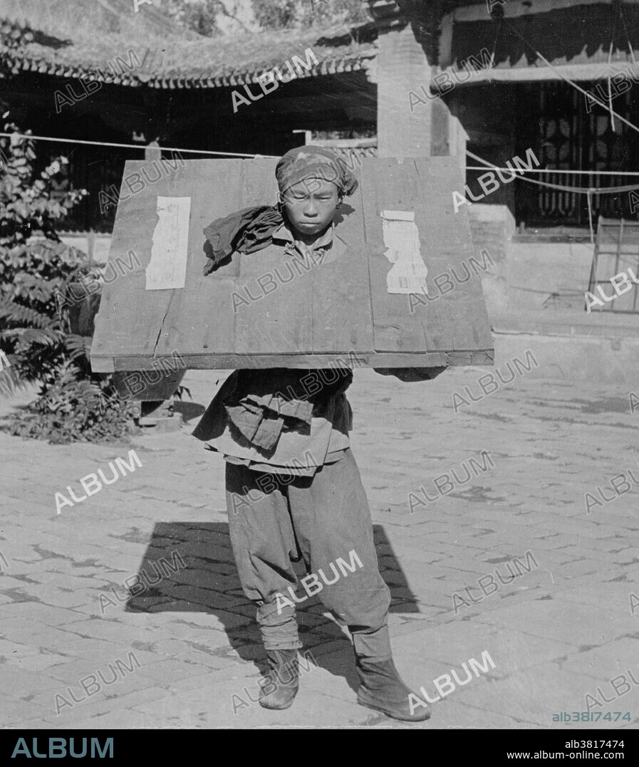 Boxer Rebellion Prisoner in Cangue, 1900