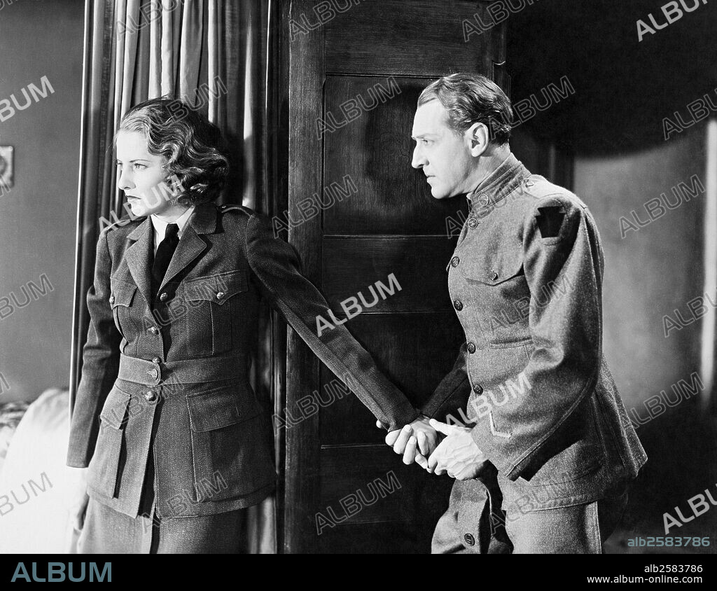 BARBARA STANWYCK and OTTO KRUGER in EVER IN MY HEART, 1933, directed by ARCHIE MAYO. Copyright WARNER BROTHERS.