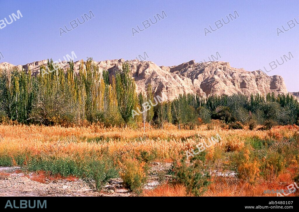 The Kizil Caves (Qizil Ming Oy; Kizil Cave of a Thousand Buddhas) are 236 Buddhist rock-cut caves located near Kizil Township in Xinjiang. The site is located on the northern bank of the Muzat River 75 kilometres by road northwest of Kucha (Kuqa). This area was a commercial hub of the Silk Road. The caves are said to be the earliest major Buddhist cave complex in Xinjiang, with development occurring between the 3rd and 8th centuries. Although the site has been both damaged and looted, at least 1000 square metres of wall paintings—mostly Jataka stories—remain.