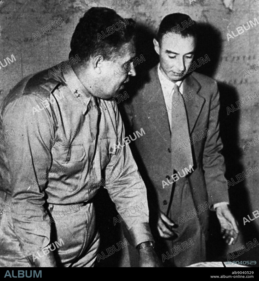 General Leslie Groves (left), military head of the Manhattan Project, with Prof. Robert Oppenheimer (right).