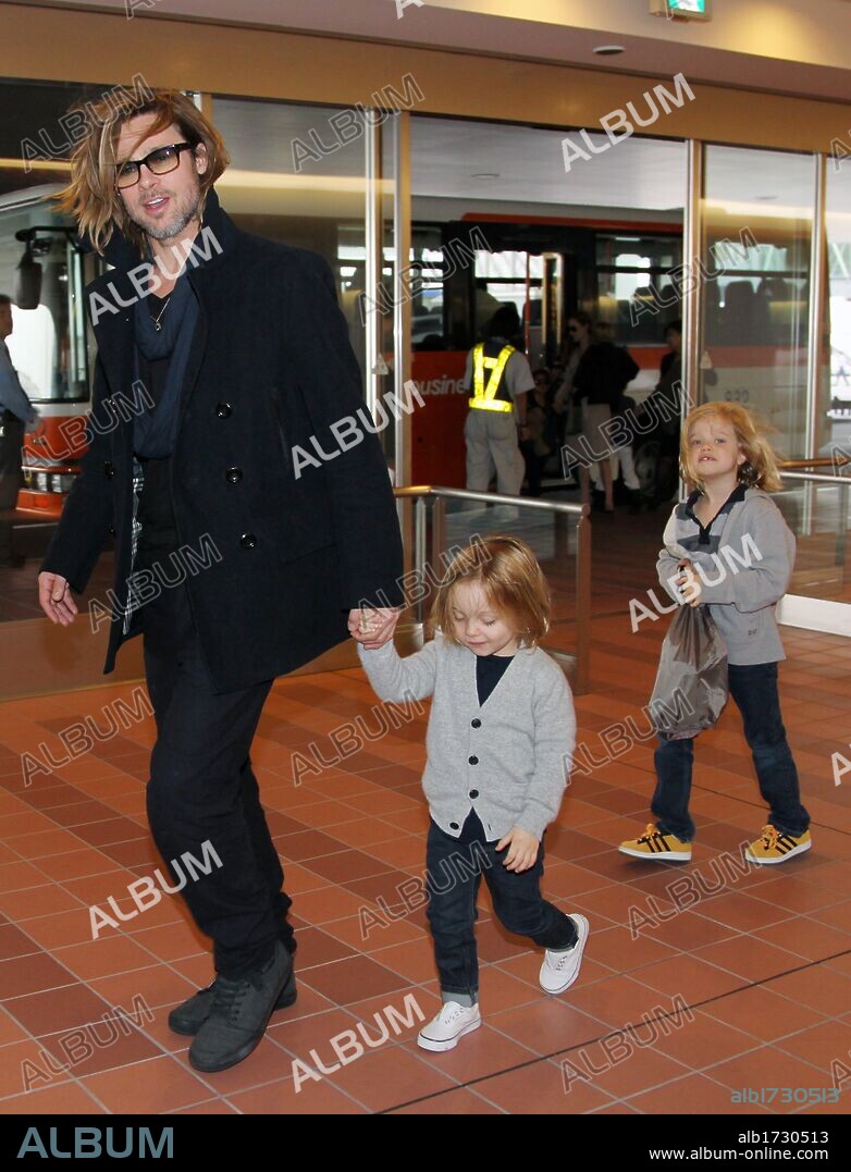SHILOH NOUVEL JOLIE-PITT and BRAD PITT. Nov. 8, 2011 - Tokyo, Japan - Actor BRAD PITT arrives at Haneda Airport with his children and his partner Angelina Jolie on November 8, 2011 in Tokyo, Japan. They are in Japan to promote the film ''Moneyball. 08/11/2011