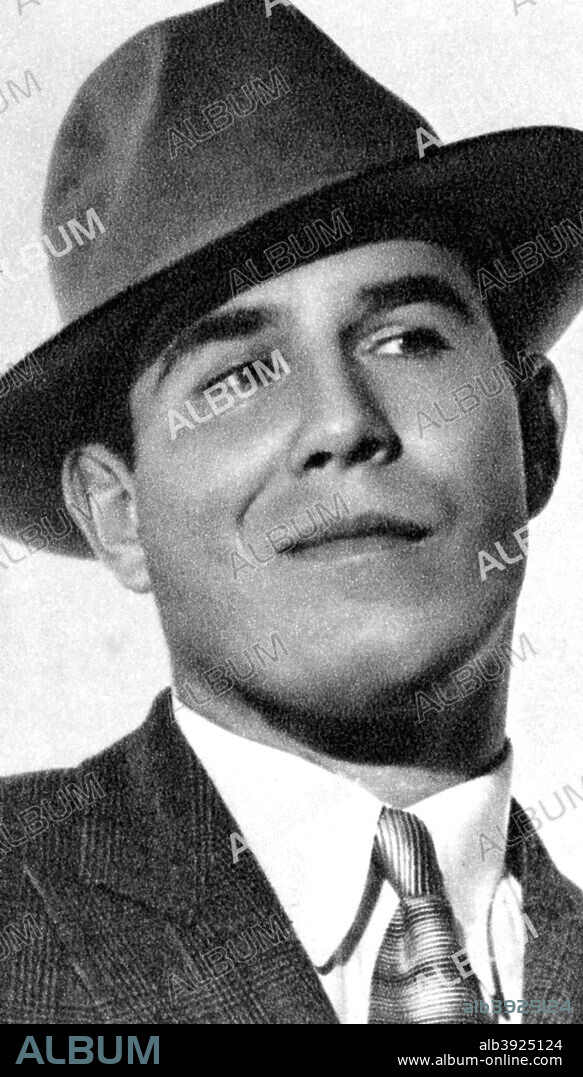Nat Pendleton, American Olympic wrestler and actor, 1934-1935. Pendleton won a silver medal at the 1920 summer Olympics. He moved into acting in the late 1920s, often playing heavies, although he is best remembered for playing the circus strongman Eugen Sandow in the Oscar-winning The Great Ziegfeld (1936). Taken from Meet the Film Stars, by Seton Margrave. (London, 1934-1935).