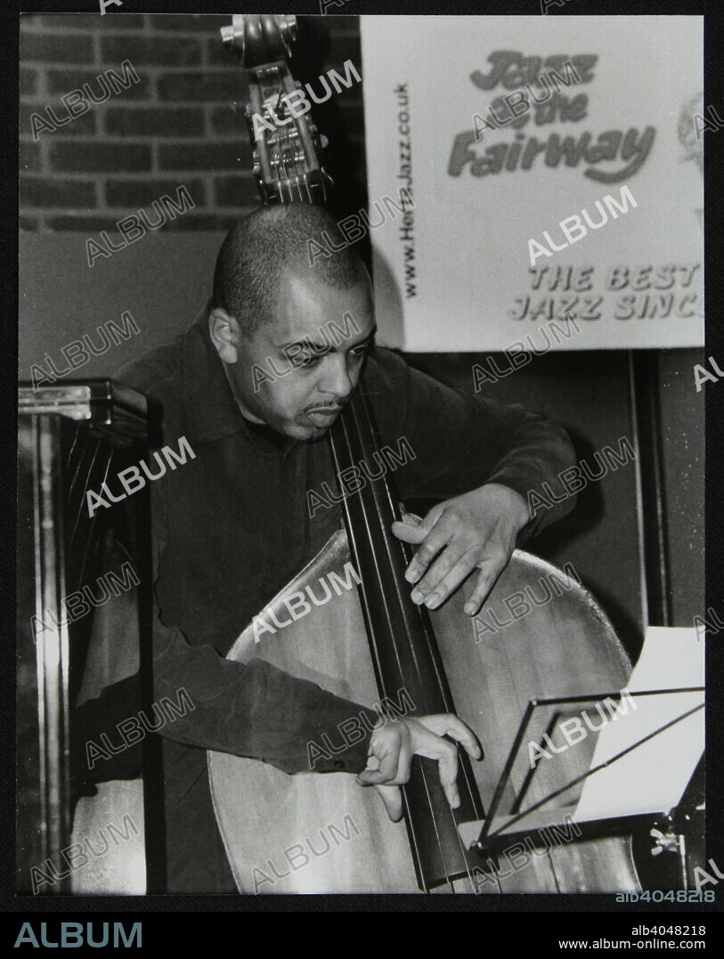 Double bassist Gary Crosby playing at The Fairway, Welwyn Garden City, Hertfordshire, 25 January 2004.