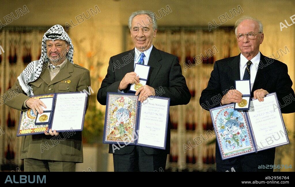 Photograph of Yitzhak Rabin, Shimon Peres and Yasser Arafat receiving the Nobel Peace Prize following the Oslo Accords. Dated 1994.