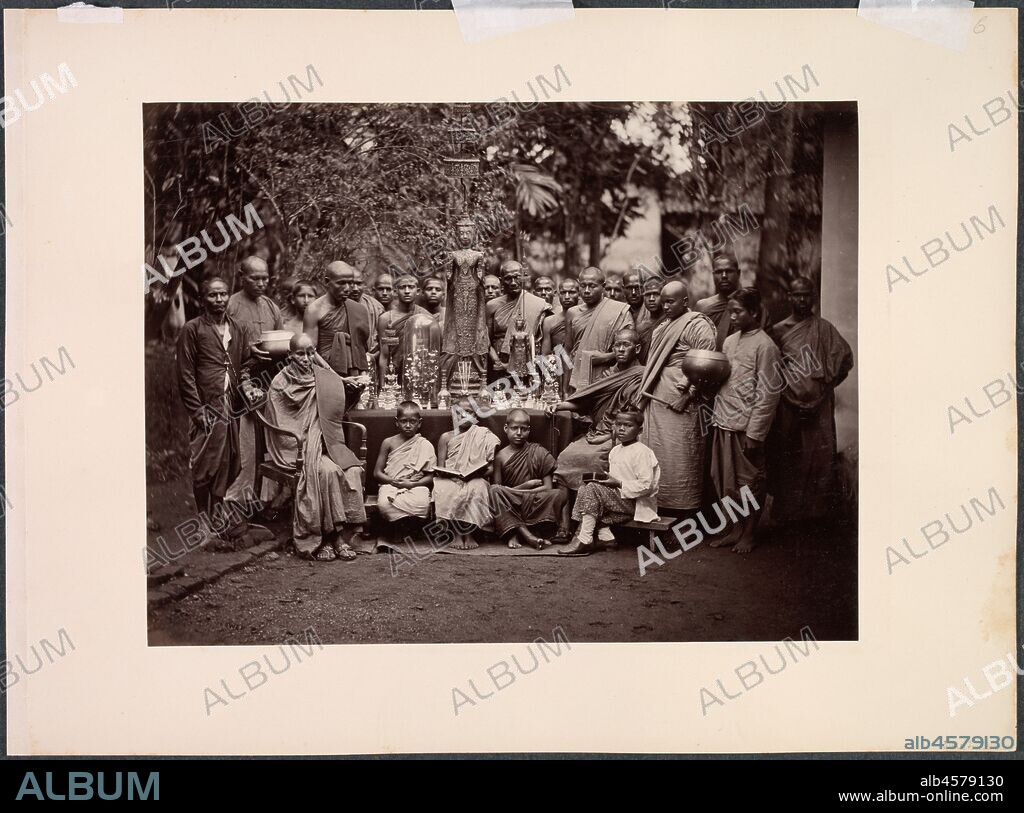 Untitled (recto); Untitled (verso), 1880s. Probably taken by one of two British photographic firms based in Ceylon (present-day Sri Lanka), this image was likely shot by a European and was definitely made for a European audience, not for the individuals depicted. It is unlikely the sitters ever saw the finished photograph. Such ethnographic portraits were collected by governments as information, by tourists as souvenirs, and by "armchair travelers" as aids to the imagination. Viewers of the era would have regarded it more as a depiction of a cultural type than as a record of individual lives. Because interiors of temples were too dark to yield an image, the photographer arranged these Thai monks and worshippers along with some of their religious objects outdoors.
