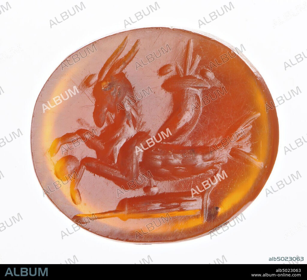 ibex with a fish tail and a globe between the front legs. Behind the back a cornucopia and a rudder under the body. Hindquarters scaly, gem, intaglio, ringstone, stone, carnelian, Color: orange, transparent, Shape: oval, lying, Processing: Maaskant-Kleibrink, M., Catalog of the engraved gems at the Royal Coin Cabinet, 1978, p. 60, fig. 2, type F1, 10 x 12 mm. Thickness 2 mm., 2nd - 3rd century after Chr. 100-300, Netherlands, Limburg, unknown, unknown.