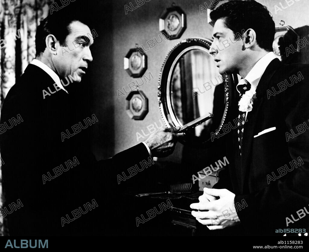 ANTHONY QUINN and FARLEY GRANGER in THE NAKED STREET, 1955, directed by MAXWELL SHANE. Copyright UNITED ARTISTS.
