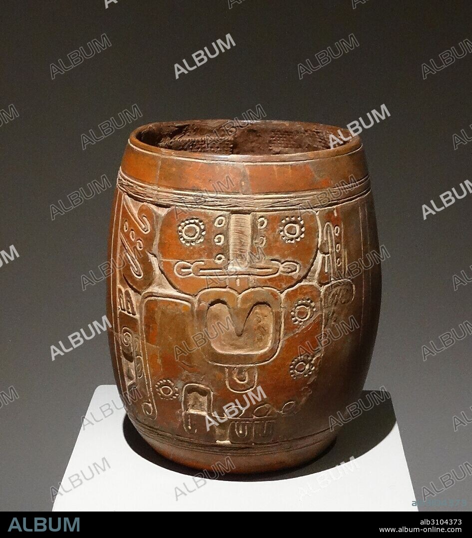 Mayan ceramic vase, with an engraved figure of a god with a large nose. Uxmal, Yucatan, Mexico 600-900AD.