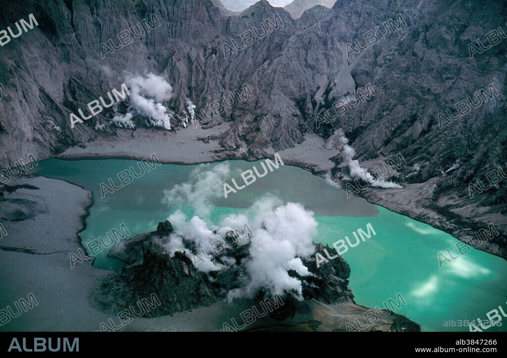 Mount Pinatubo in the Philippines has an acidic bright green volcanic lake in its summit crater. Gasses and minerals seeping into the lake give it its color. After years of slumber Mount Pinatubo on Luzon Island Exploded to life in 1991 with one of the largest volcanic eruptions in the 20th Century. Pinatubo is known for its Plinian Type Volcanic Eruptions.